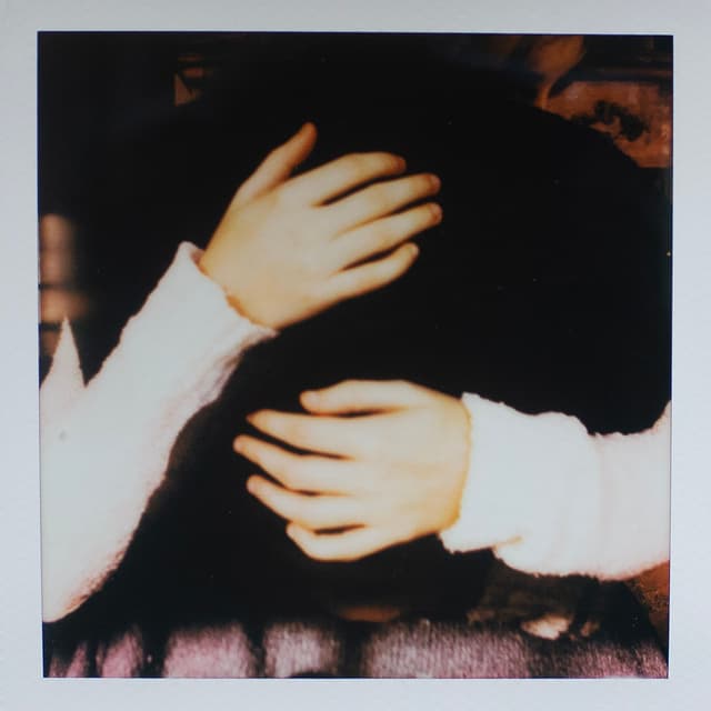 Album cover art for We Hug Now