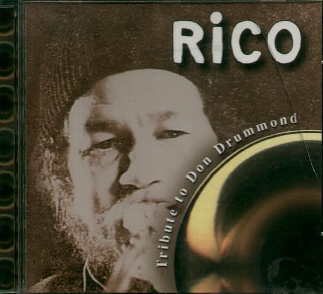 Album cover art for Reco In Reggae Land "Paying A Tribute To John Drummond"