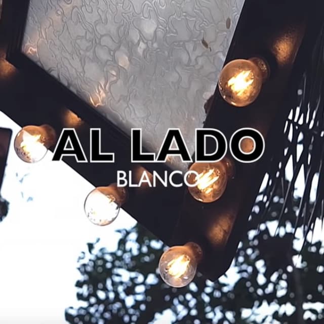 Album cover art for Al Lado