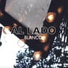AL LADO