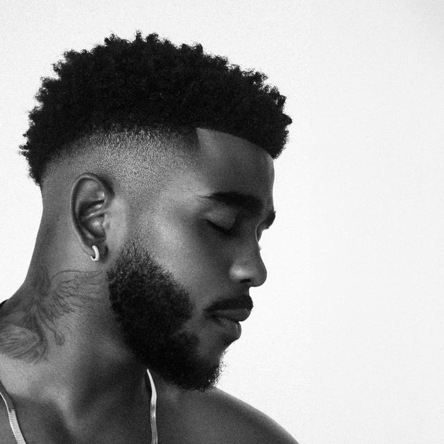 Album cover art for Caught Between 2 Worlds