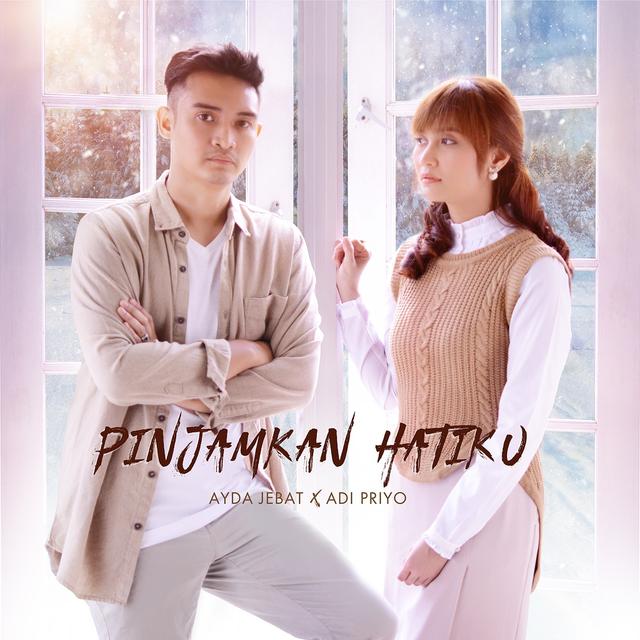 Album cover art for Pinjamkan Hatiku