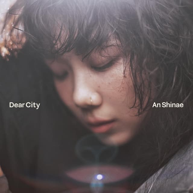 Album cover art for Dear City