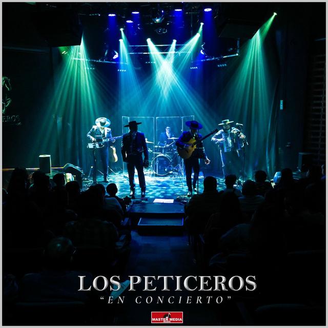 Album cover art for En Concierto