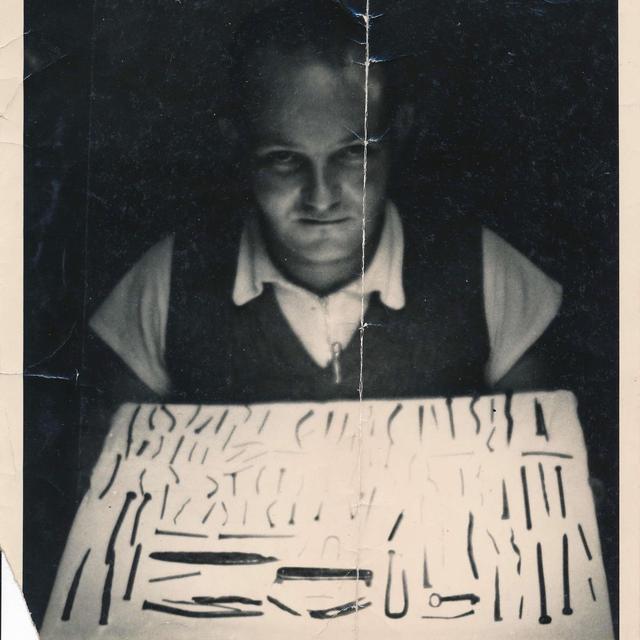 Album cover art for One Hand Behind the Devil