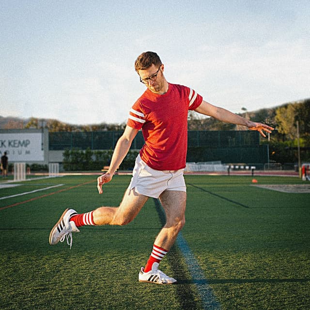 Album cover art for The Beautiful Game