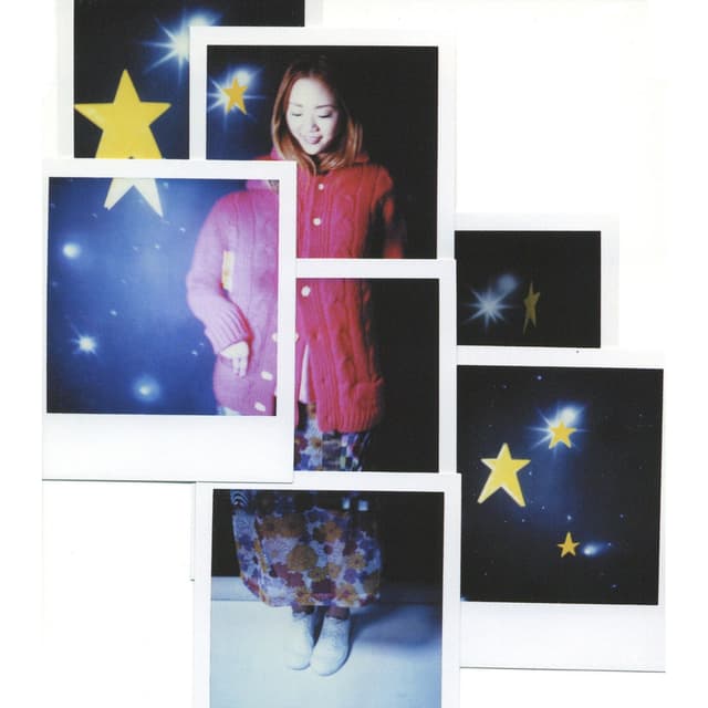 Album cover art for 喝采とメランコリック